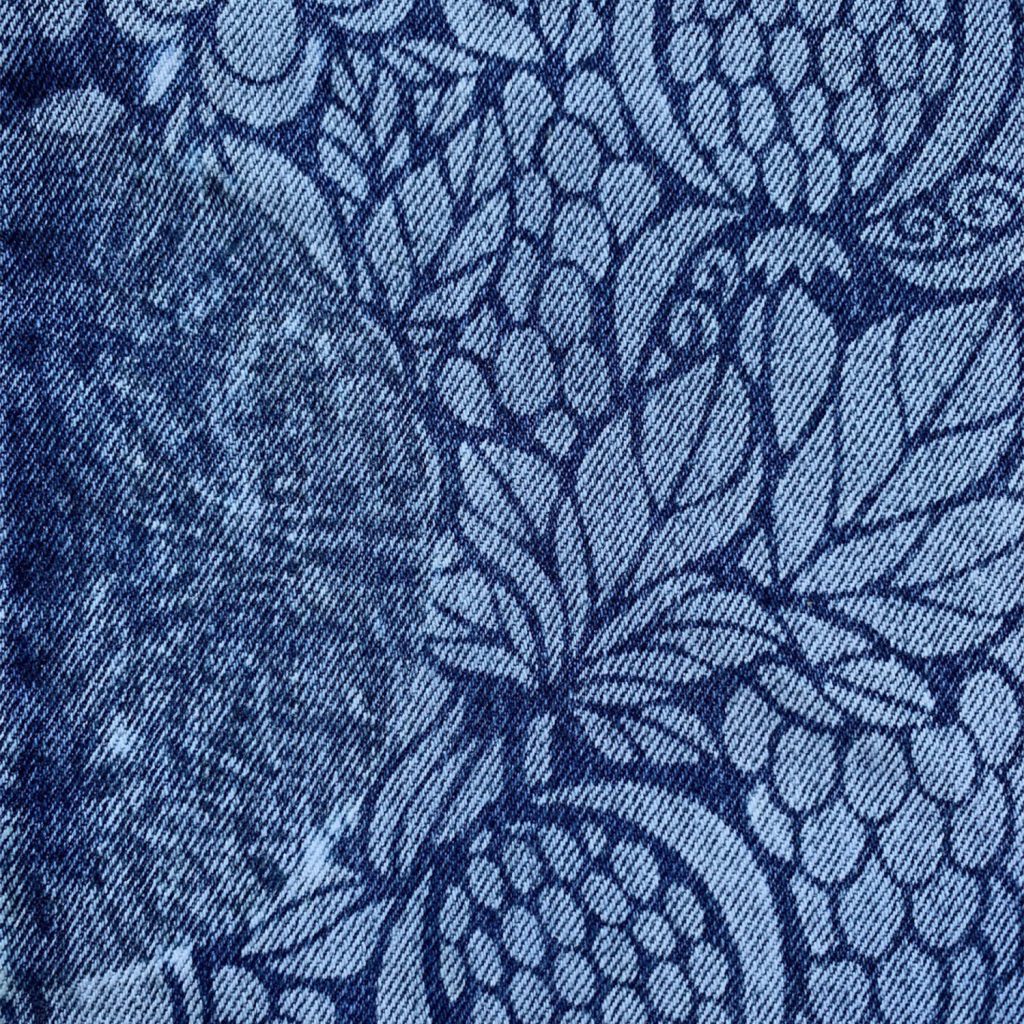 Décor floral gravé au laser CO₂ sur du tissu en jean